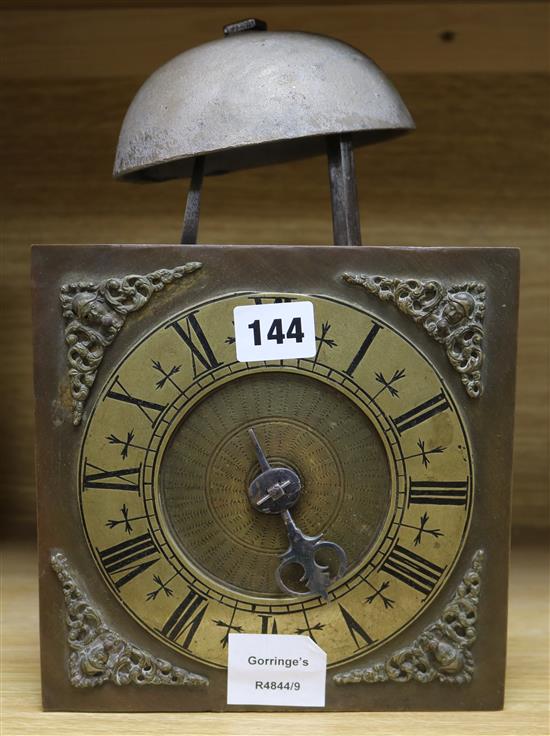 A 17th century style brass dial shelf clock, with single hand height 28cm